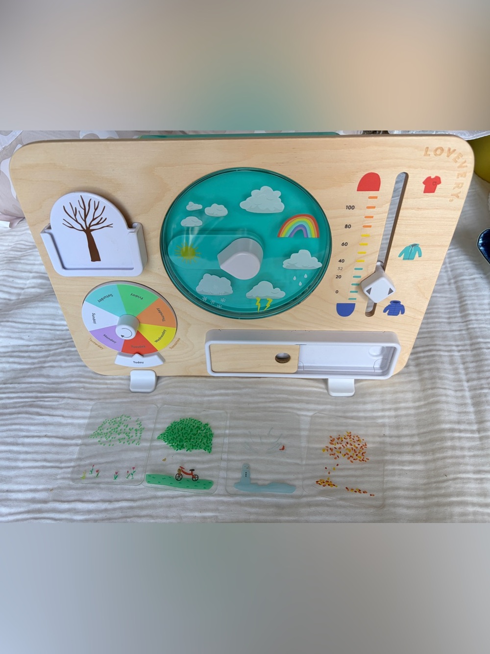 Lovevery Wooden Kids Activity Board with Teal Weather Spinner